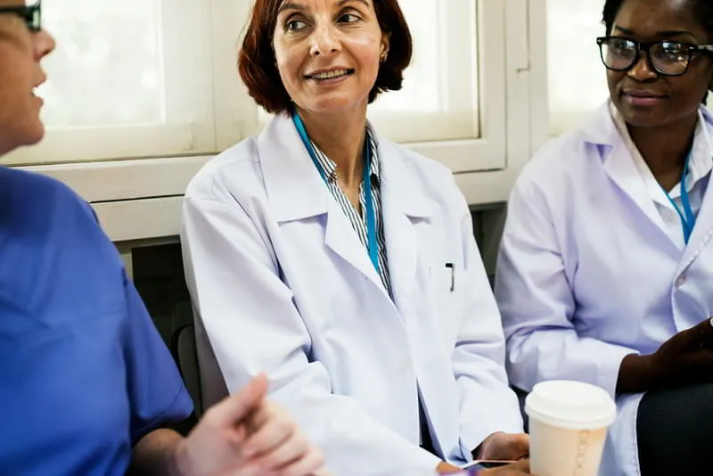 Healthcare professionals in a consultation setting